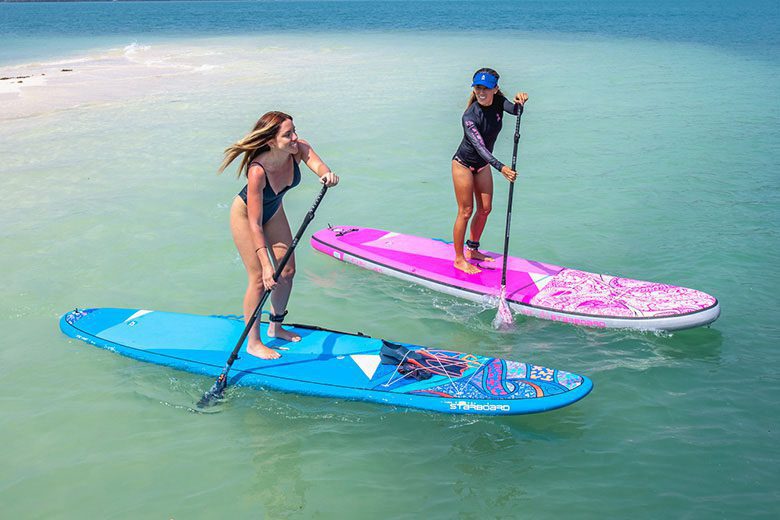 Ladies paddling the Starboard SUP Tikhine paddle boards. Available at Riverbound Sports in Tempe, Arizona.