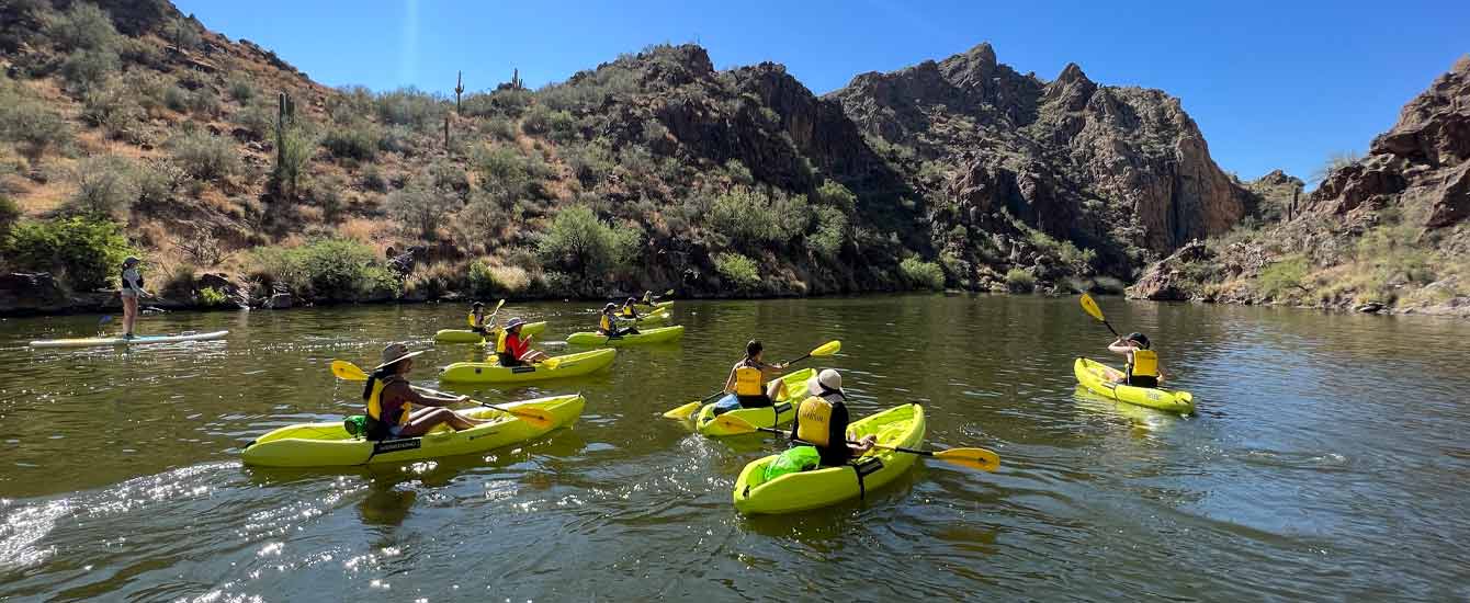 A Bachelorette party enjoying a Kayaking Tour at Saguaro Lake just outside Scottsdale and Mesa, Arizona. Come join Riverbound on one of our Phoenix area tours.