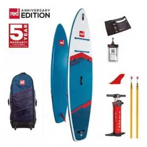 Red paddle board Sport 11'0" x 30" Anniversary model with accessories and 5-year warranty. Available at Riverbound Sports in Tempe, Arizona.