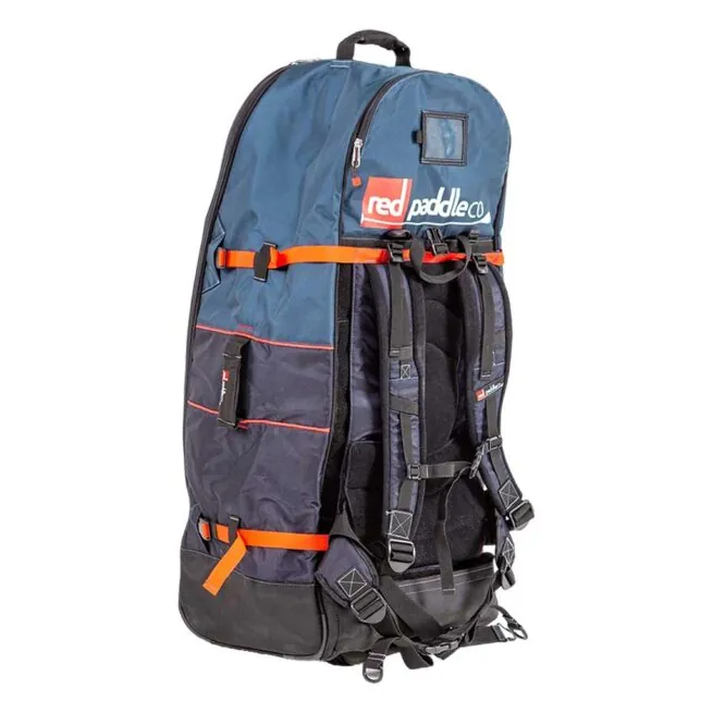 Blue and black Red Paddle Co ATB Transformer backpack with red straps, logo visible.