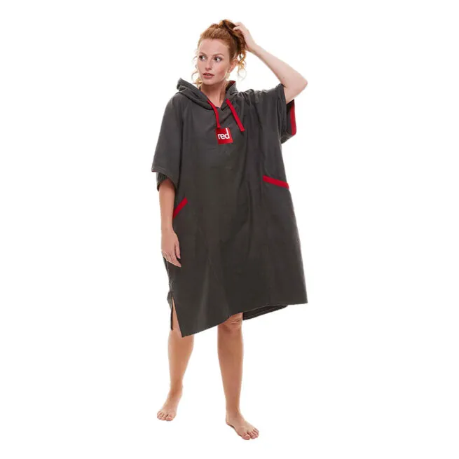 Woman modeling gray Red Paddle Co hooded quick dry changing robe with red accents front view. Available at Riverbound Sports in Tempe, Arizona.