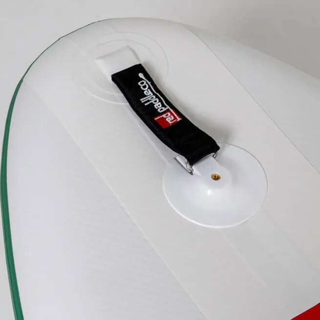 Surfboard with attached leash, close-up view.
