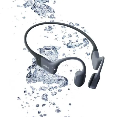 Shokz Openwater Pro Waterproof headphones surrounded by splashing water. Available at Riverbound Sports.