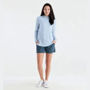 Woman in clear sky lightweight bamboo hoodie. Available at Riverbound Sports in Tempe, Arizona.