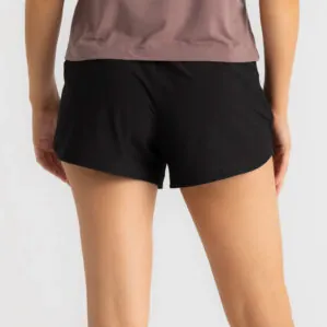 Woman wearing black Free Fly Breeze Bamboo athletic shorts, rear view. Available at Riverbound Sports in Tempe, Arizona.