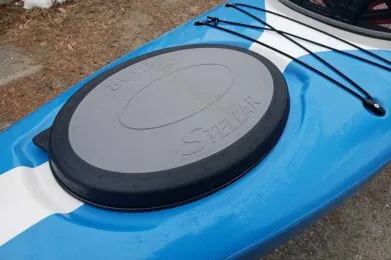 Blue kayak with black Stellar hatch cover.