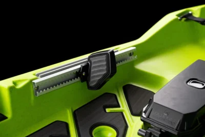 Close-up of green kayak with attached gear